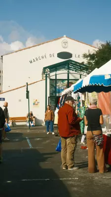 People standing outside Marché de la Chaume.