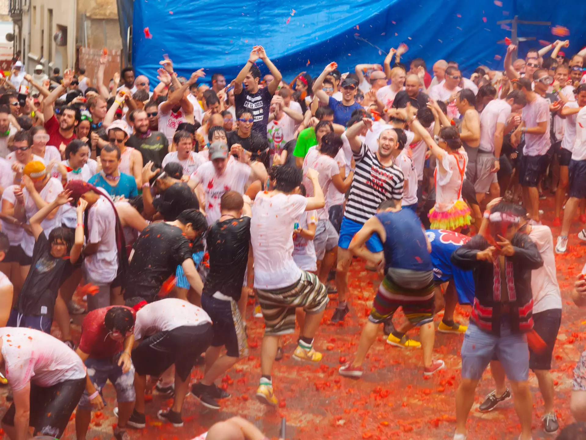 La Tomatina festival in August 28, 2013 in Bunol, Spain. Battle of tomatoes.