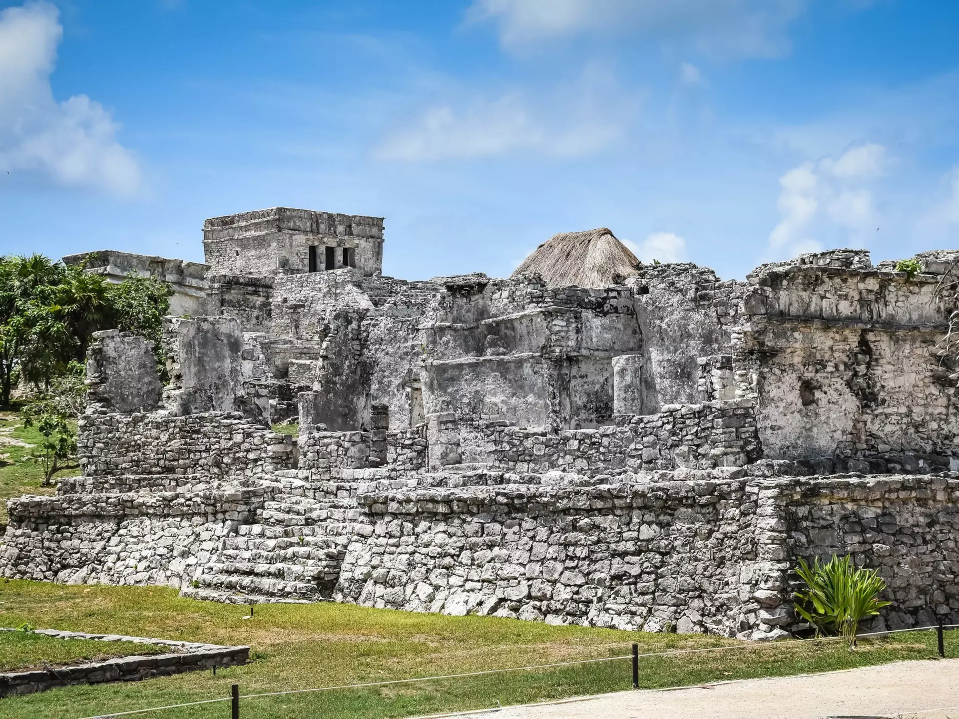 The House of Halach Uinic and the castle within the ruins of Tulum. AcropolypsePhotography/Shutterstock