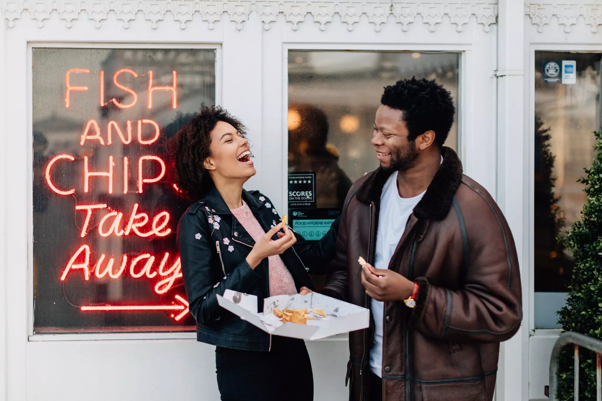 Eating fish and chips is virtually synonymous with a day at the seaside in England © Roo Lewis / Getty Images