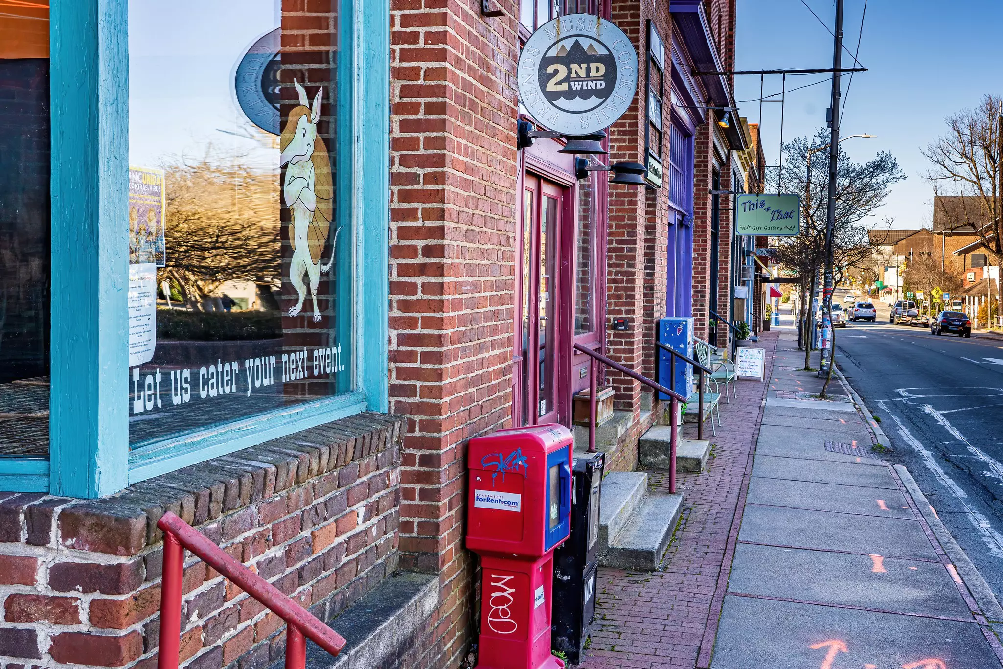 Brick storefronts on a small-town street