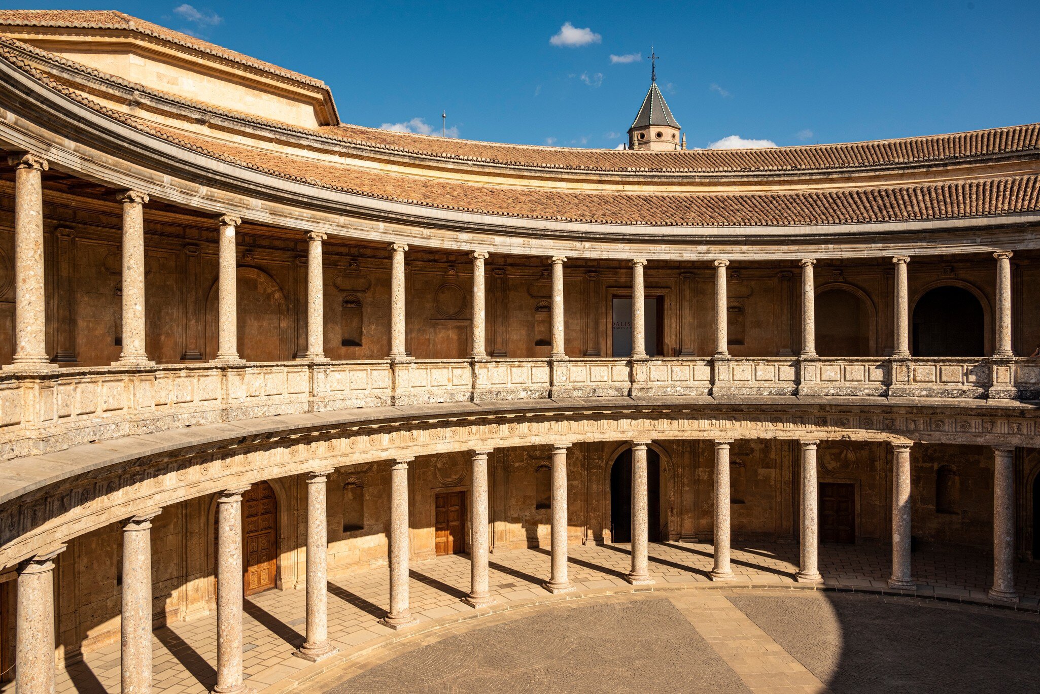 The unique circular patio of the Palacio de Carlos V at the Alhambra complex in Granada, Spain.