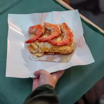 Fresh fried shrimp served at the Saturday walking street market in Chiang Mai, Thailand. 