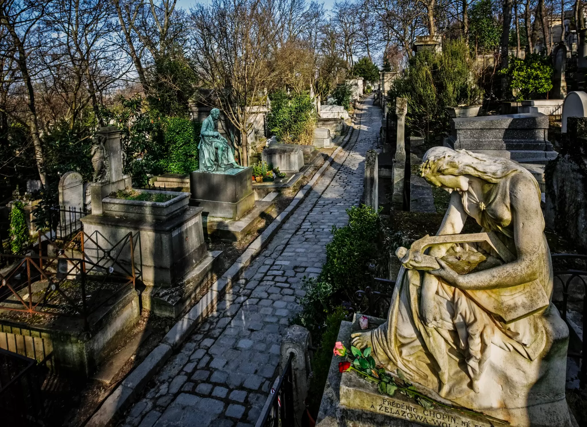 White marble statue on the tomb of Frederic Chopin (1810-1849), composer and Polish pianist.