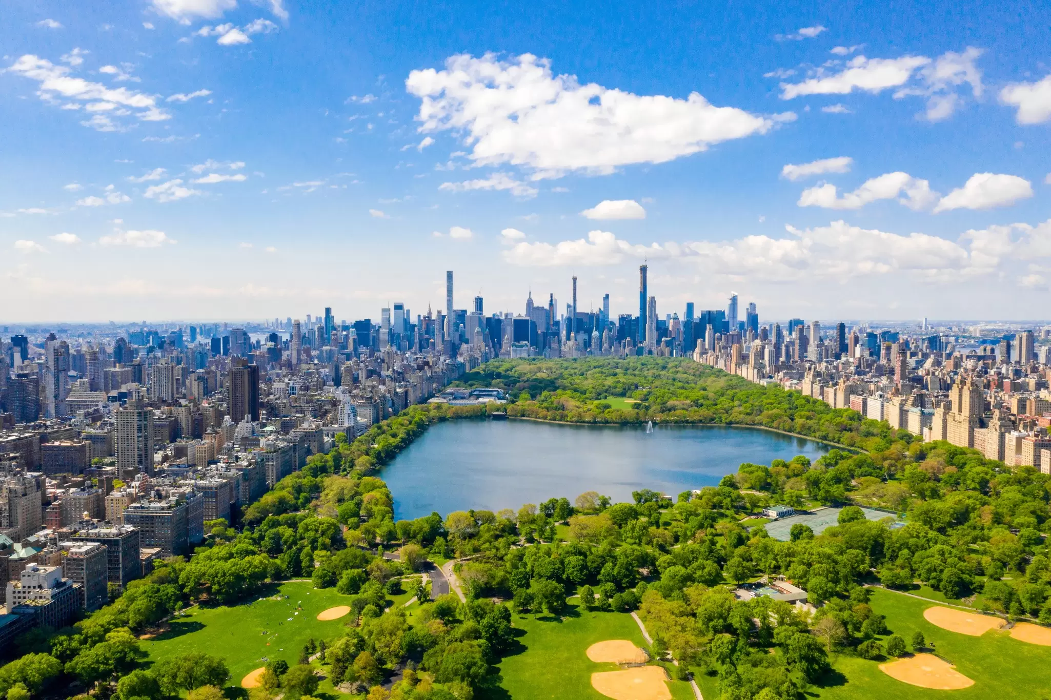 Aerial view of Central Park surrounded by the skyscrapers of Manhattan, New York City