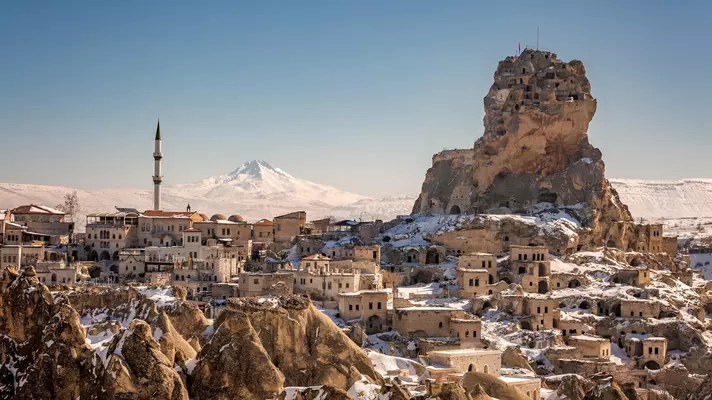 Panoramic view of Ortahisar Castle, with the mosque, old town and Erciyes Dağı (Mt Erciyes) in the background. 