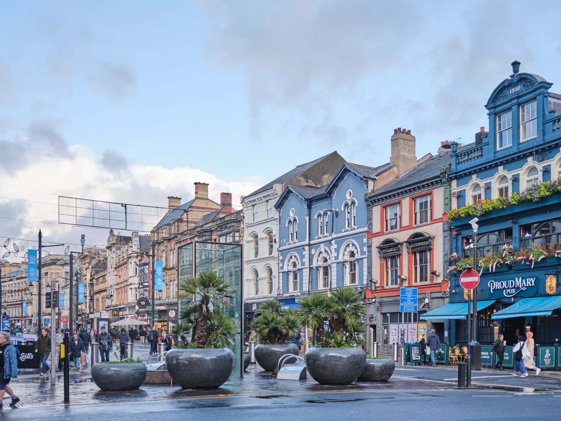 The buildings that line Cardiff Bay lit up against the night sky.