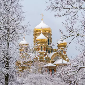 Winter snow crowns St Nicholas Maritime Cathedral in Liepāja, Latvia. 