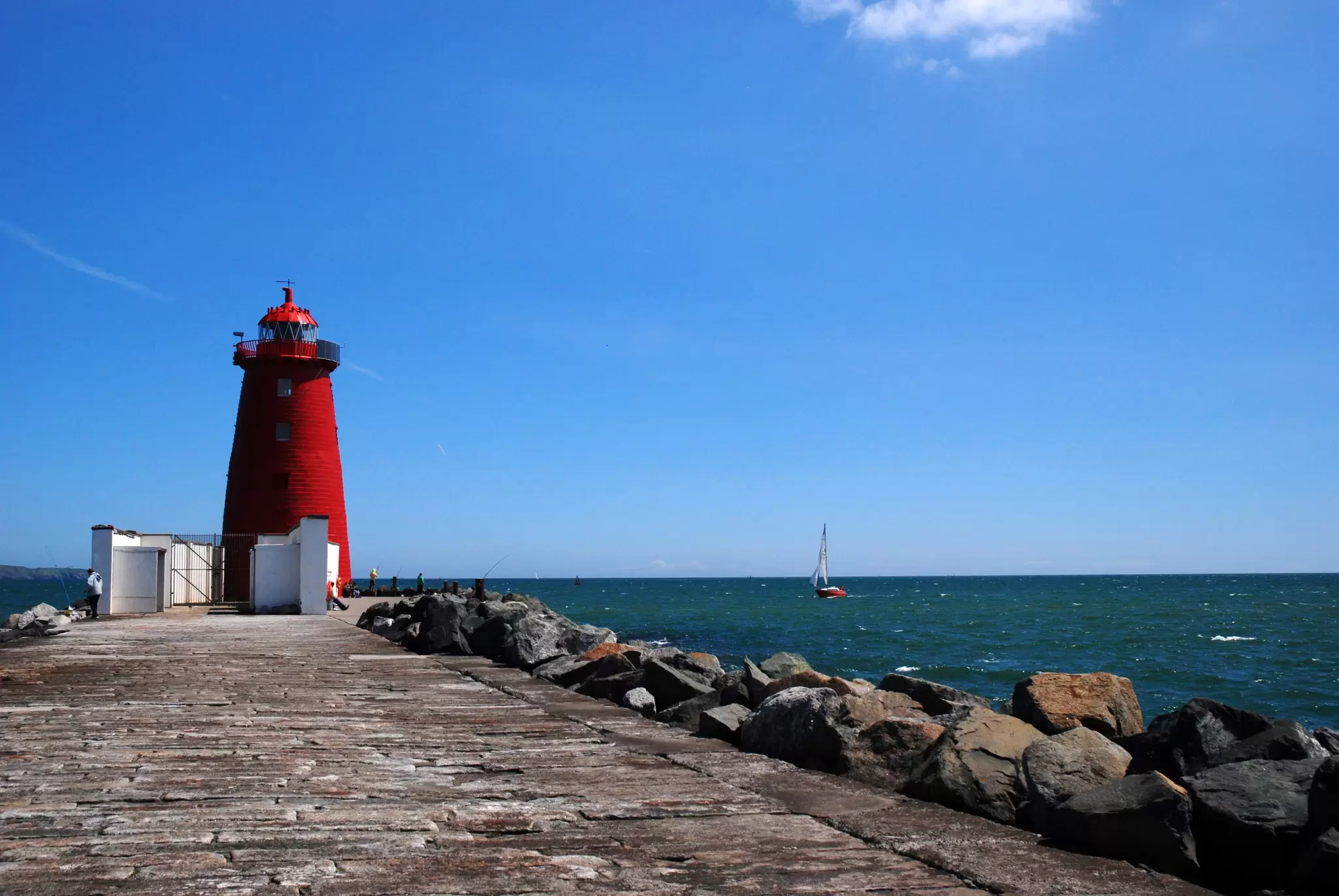 Poolbeg Lighthouse located on the Great South Wall (South Bull Wall), at the Port of Dublin, which extends from Ringsend nearly four miles out into Dublin Bay
482926317
Clear Sky, Vibrant Color, Non-Urban Scene, No People, Coastline, Irish Sea, Color Image, Scenics, Color Intensity, Red, Famous Place, Architecture, Outdoors, High Contrast, Saturated Color, Image, Dublin - Republic Of Ireland, Republic of Ireland, Day, Beach, Sea, Lighthouse, Harbor, poolbeg, ringsend, Dublin Bay, Architecture And Buildings, Built Structure, Capital Cities, Scenics - Nature, Horizontal, Photography, Poolbeg, Dublin - Republic of Ireland, Building Exterior