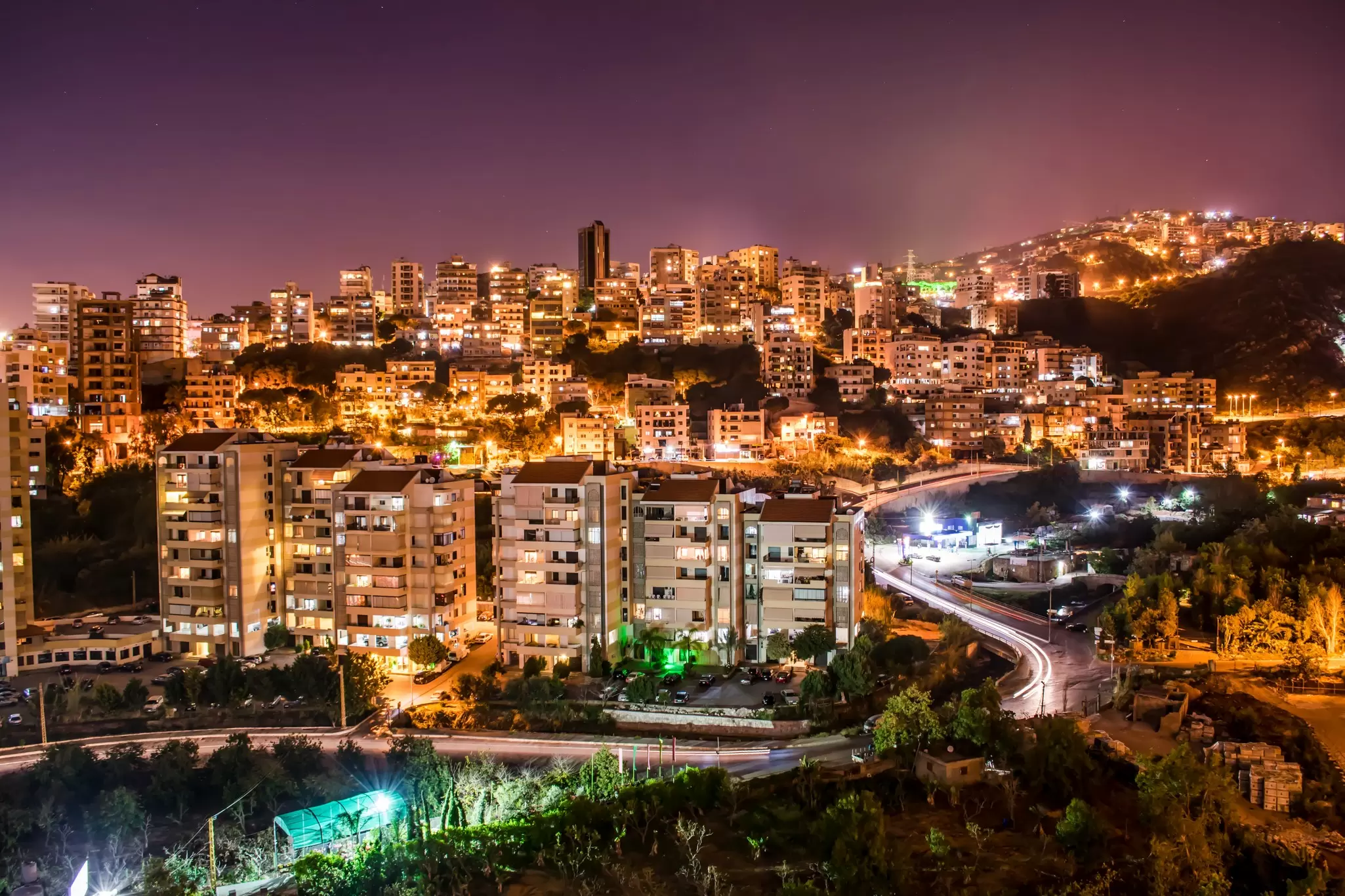 Elevated view of city at night, Beirut, Lebanon. Vrej Ohanian / 500px