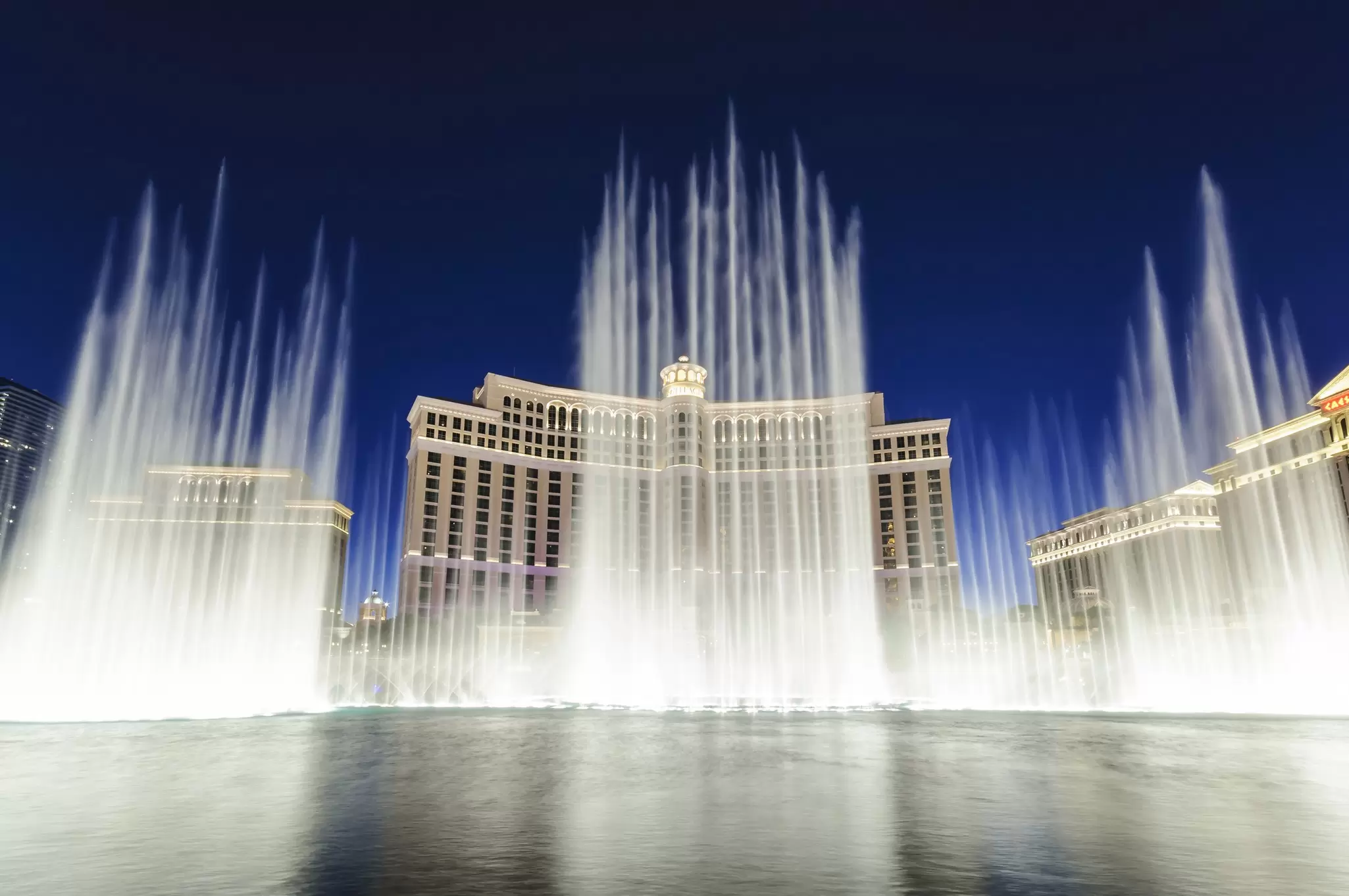 Water fountain show in front of the Bellagio Casino and Hotel at night on the strip