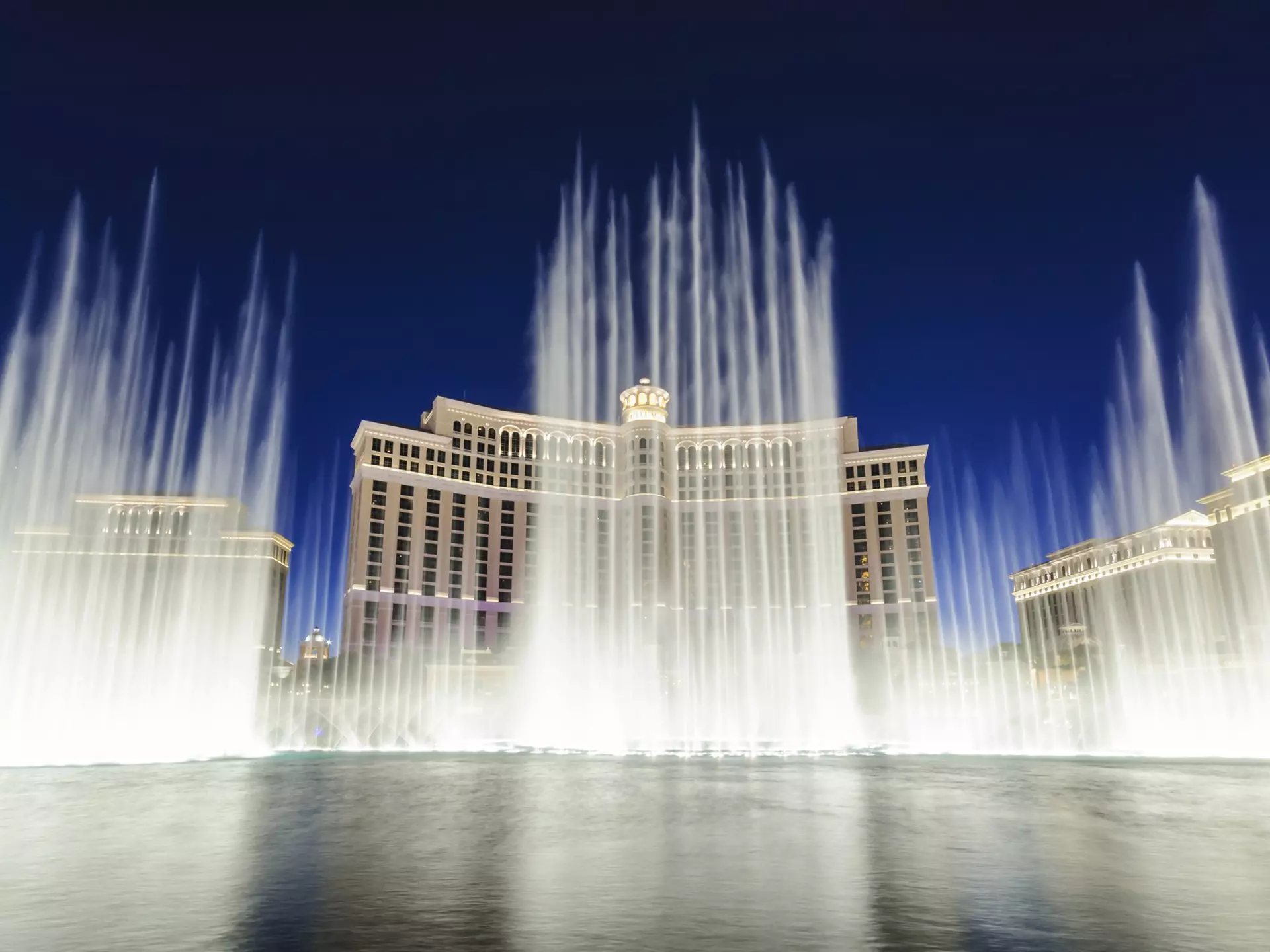 Water fountain show in front of the Bellagio Casino and Hotel at night on the strip