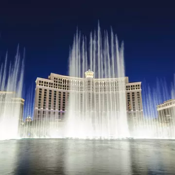 Water fountain show in front of the Bellagio Casino and Hotel at night on the strip