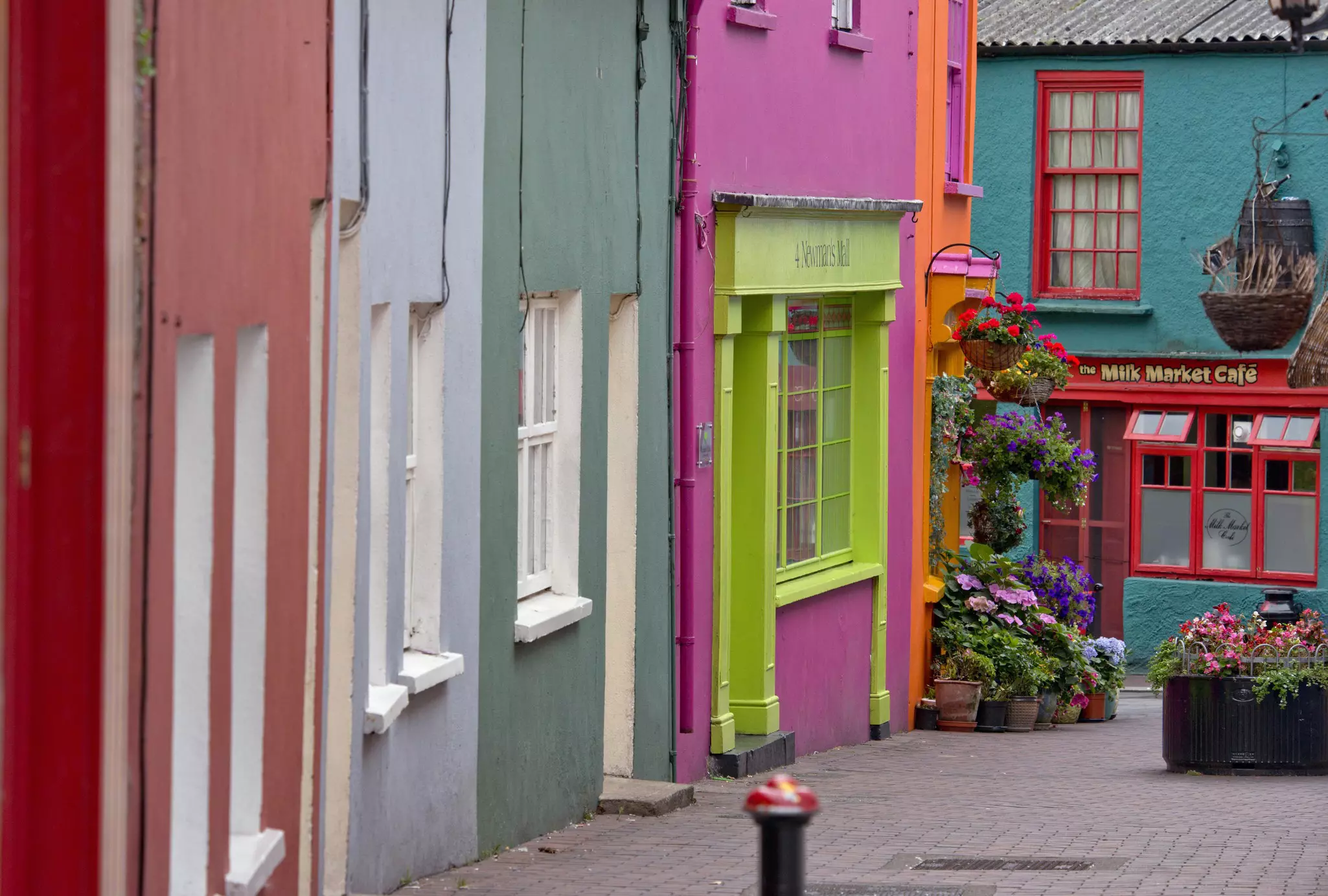Brightly painted shopfronts near Market Square. ©Pete Seaward/Lonely Planet