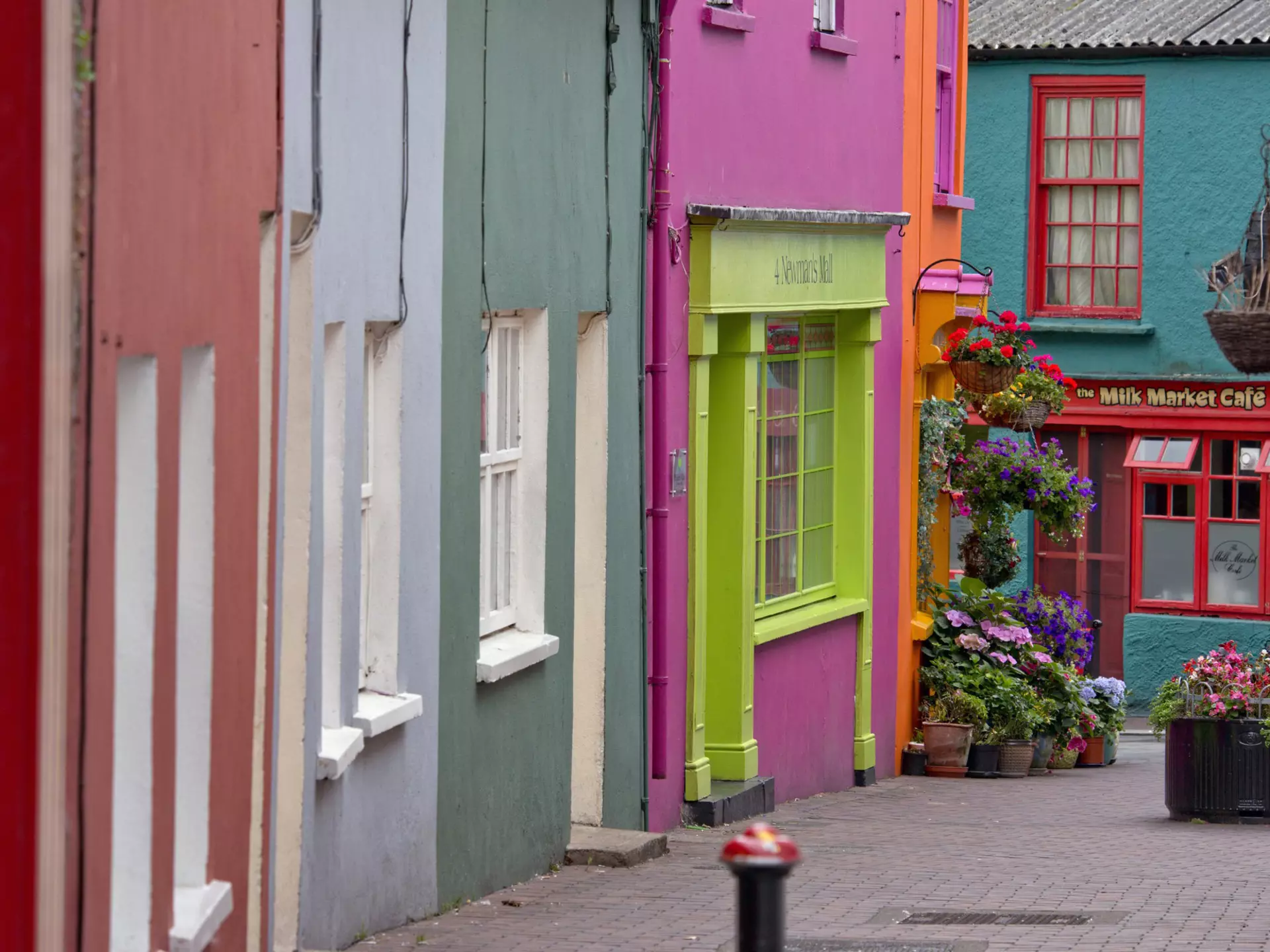 Brightly painted shopfronts near Market Square. ©Pete Seaward/Lonely Planet
