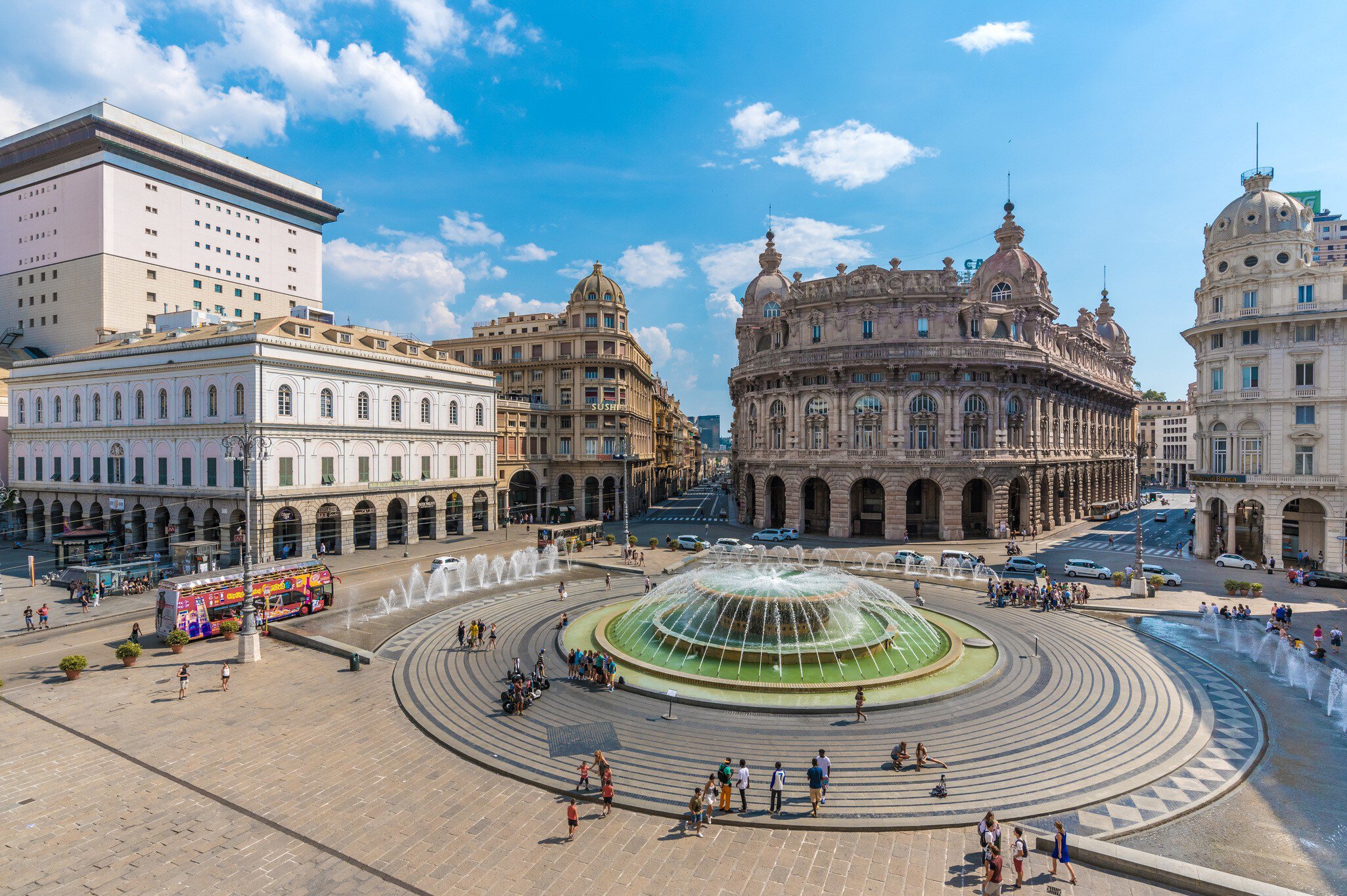 A view over the broad Piazza de Ferrari in Genoa, surrounded by historic buildings, Liguria, Italy.