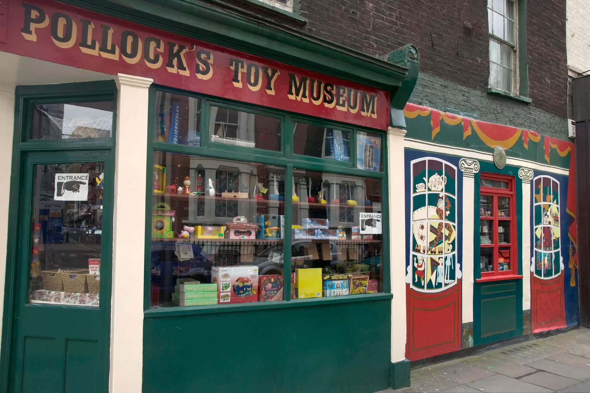 Pollock's Toy Museum.
26407-58
England, Europe, Greater London, London, United Kingdom, architecture, building exterior, capital cities, capital letter, day, door, entrance, facade, horizontal, in a row, museum, no people, outdoors, reflection, toy, window, window display