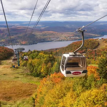 Mont-Tremblant, Quebec, Canada - October 1 2021 : Mont Tremblant Ski Resort autumn scenery. Sightseeing by Panoramic Gondola cable car in sunny day., License Type: media, Download Time: 2025-10-21T12:56:56.000Z, User: comptonsheldon109, Editorial: true, purchase_order: 56530 - Guidebooks, job: Global Publishing WIP, client: Montreal and Quebec City 7, other: Compton Sheldon