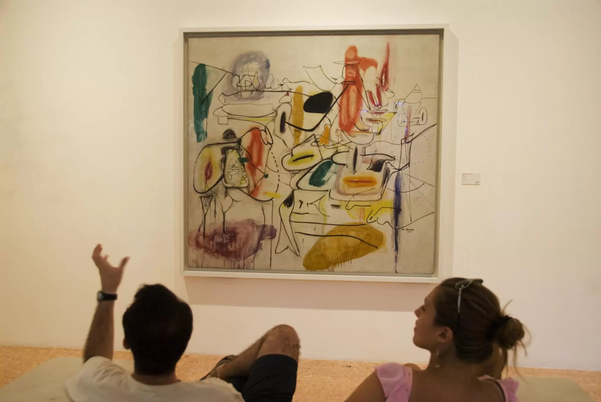 Visitors viewing an untitled Gorky painting in the Peggy Guggenheim Collection in Venice, Italy.