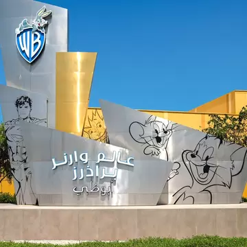 ABU DHABI - MAR 29: logotype of Warner Bros in front of entrance to the WB World theme park in Abu Dhabi on March 29. 2024 in United Arab Emirates., License Type: media, Download Time: 2026-08-03T21:50:50.000Z, User: LP_NZhan, Editorial: true, purchase_order: 65050 - Digital Destinations and Articles, job: App Content, client: Lonely Planet App, other: Nadine Zhan