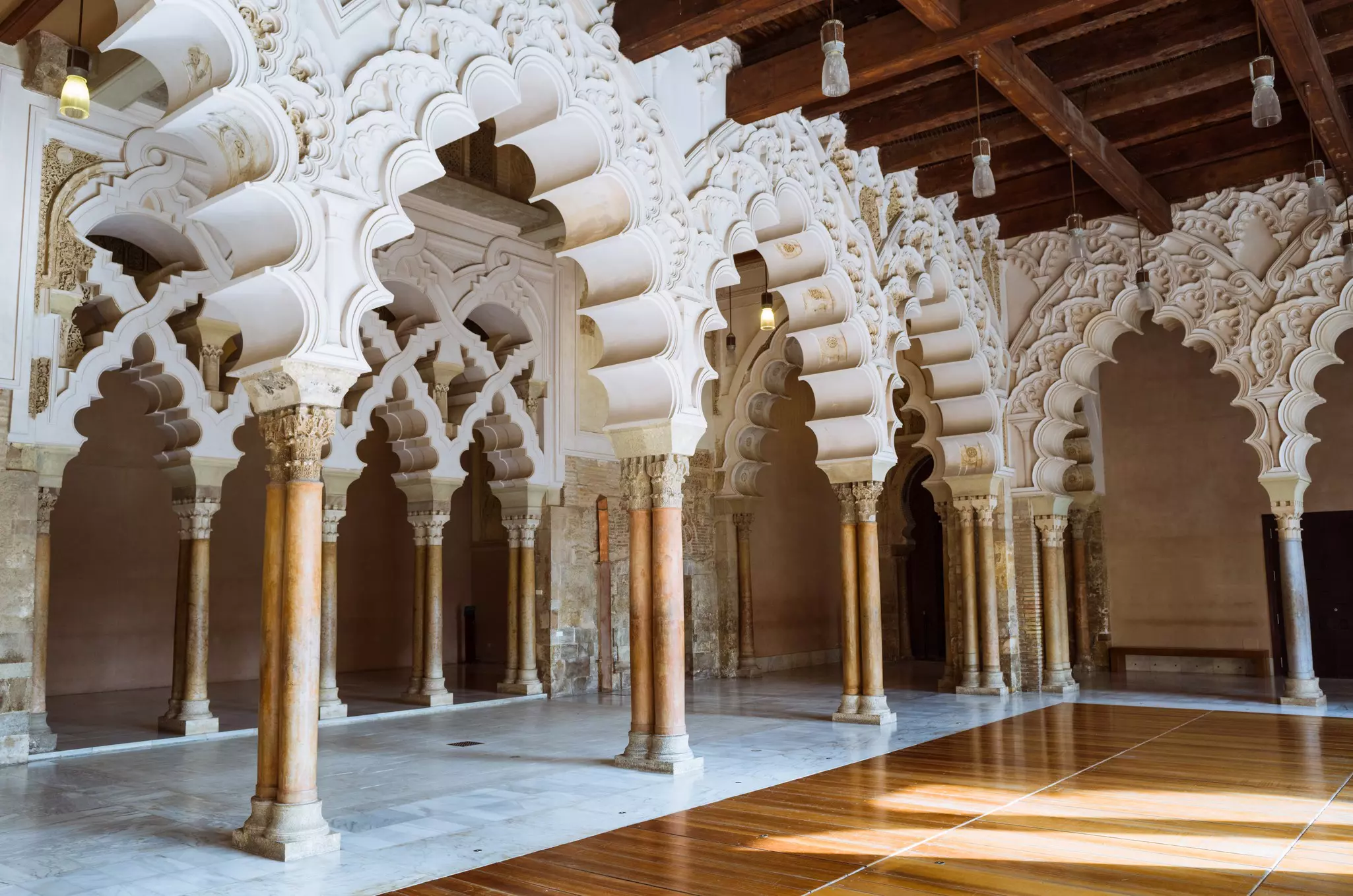 Details of a Moorish portico of the North side halls inside the Aljafería Palace, a UNESCO World Heritage Site.