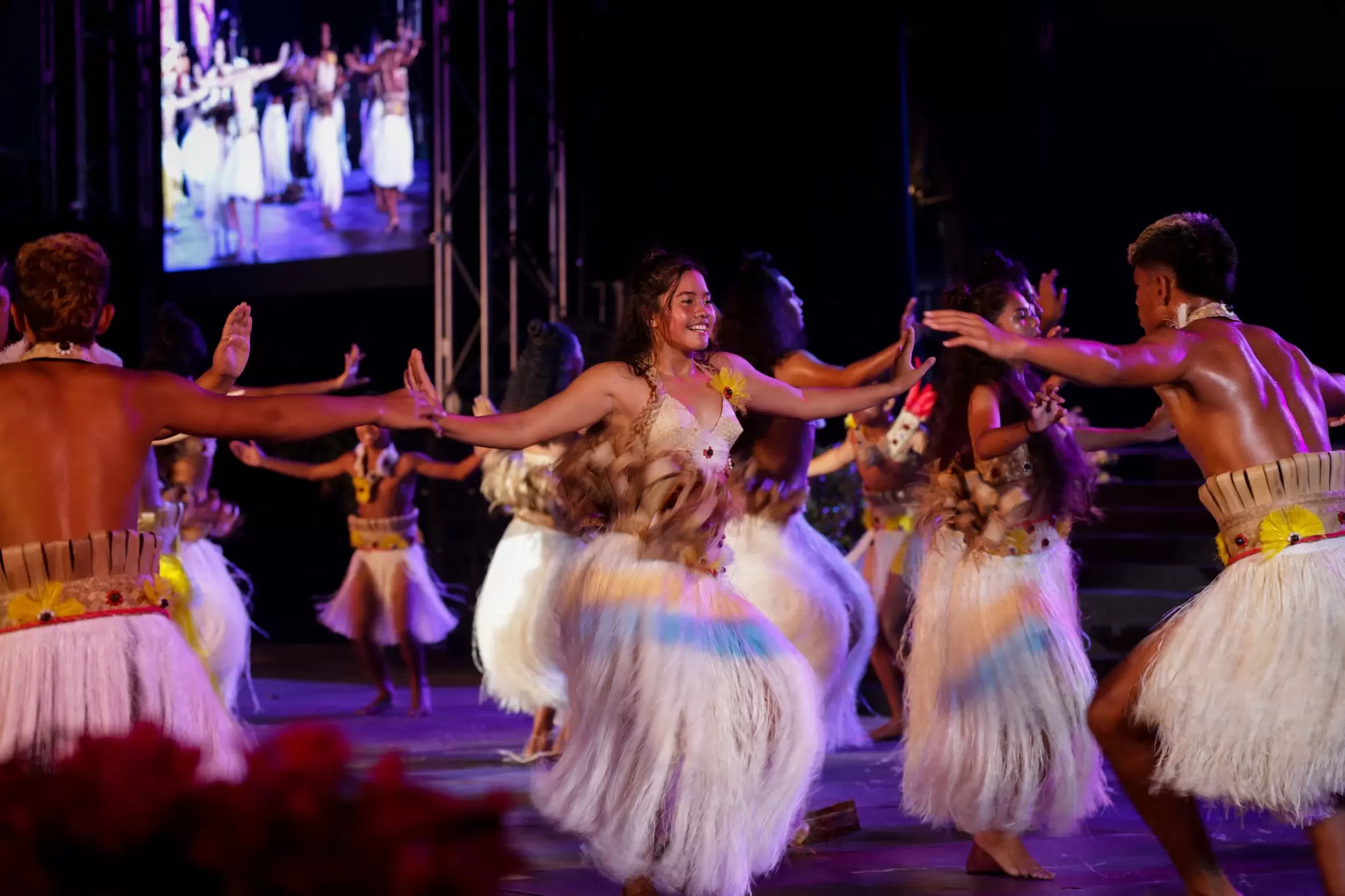 Young dancers in traditional costumes participate in festival presentation in Papeʻete, Tahiti