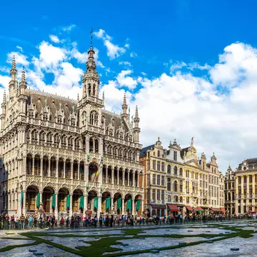 The sun shining at The Grand Place. S-F / Shutterstock
