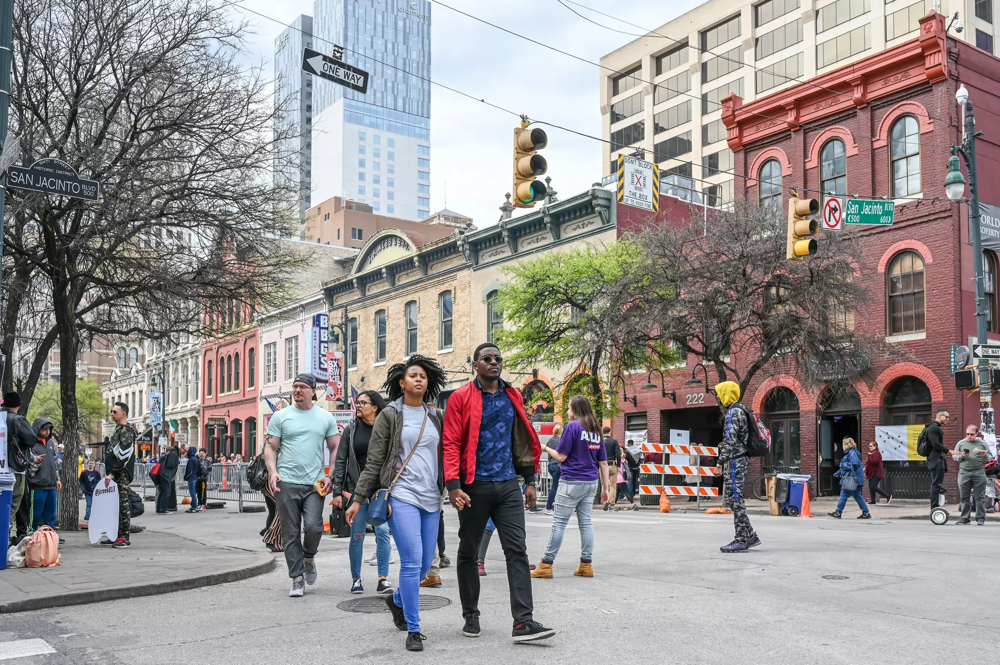 People walking along Sixth Street in Austin, Texas. 