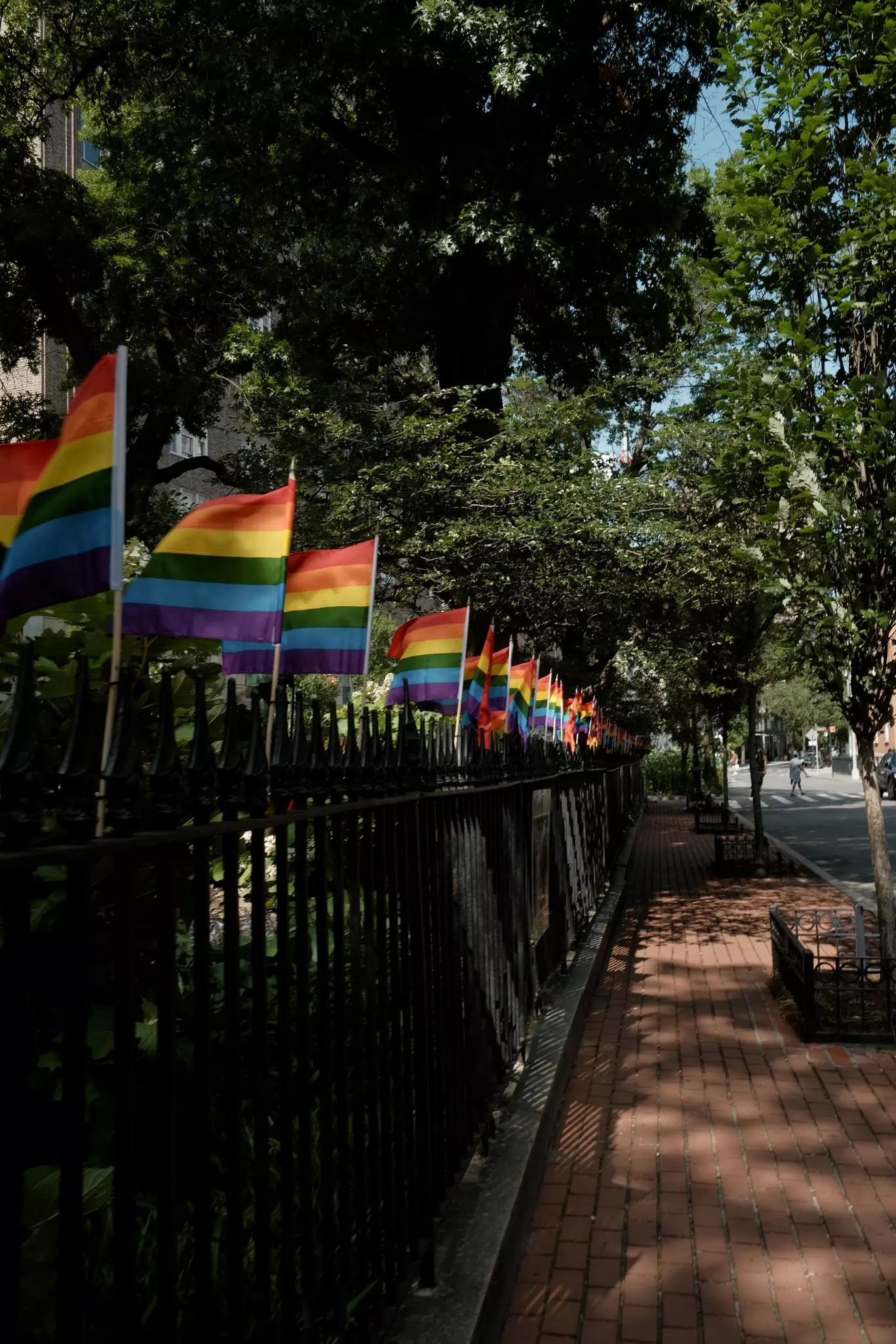 Pride flags blow in the wind at Stonewall National Monument in NYC