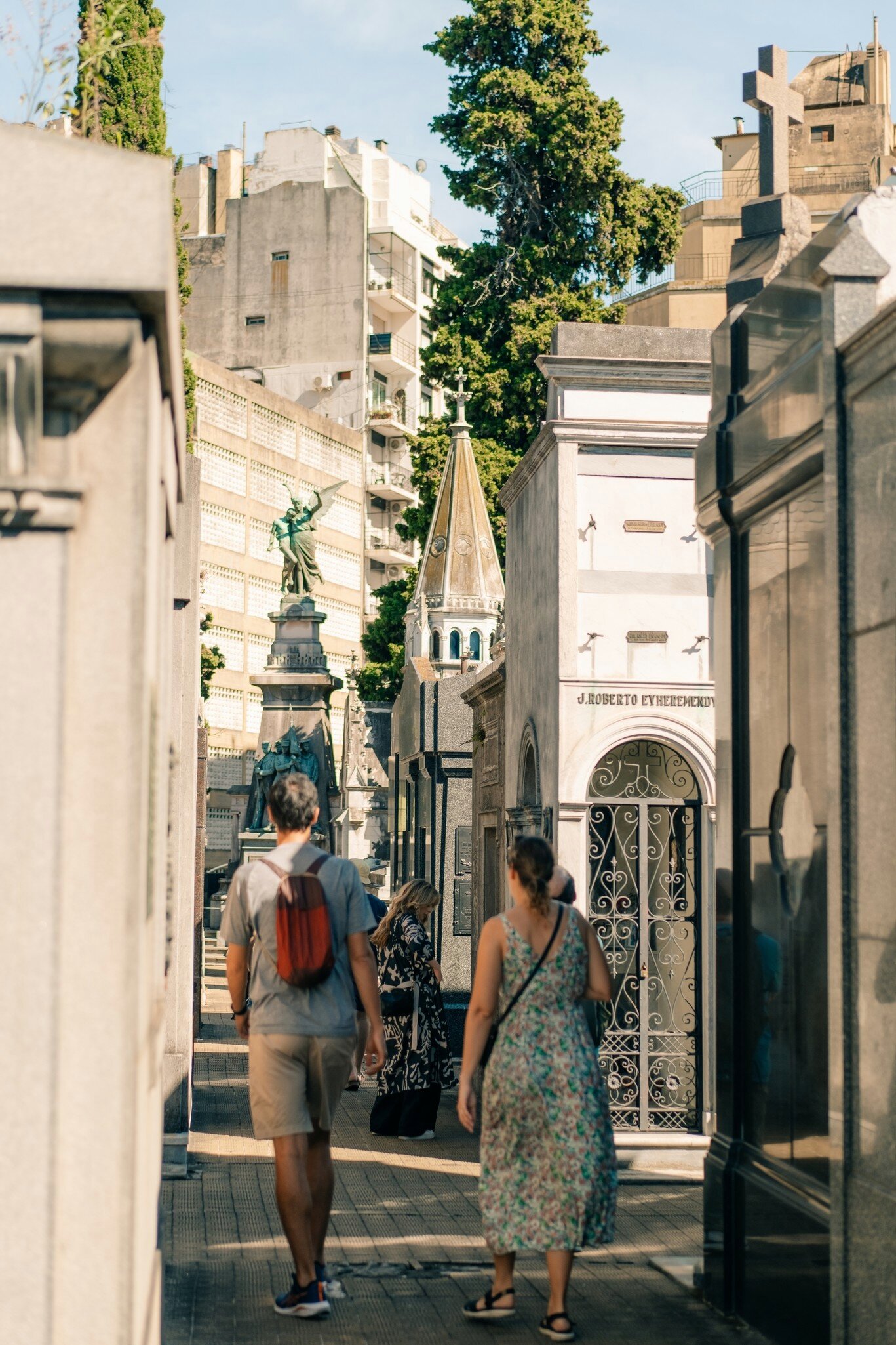 People walking through Recoleta Cemetery, the most famous cemetery in Buenos Aires, Argentina.