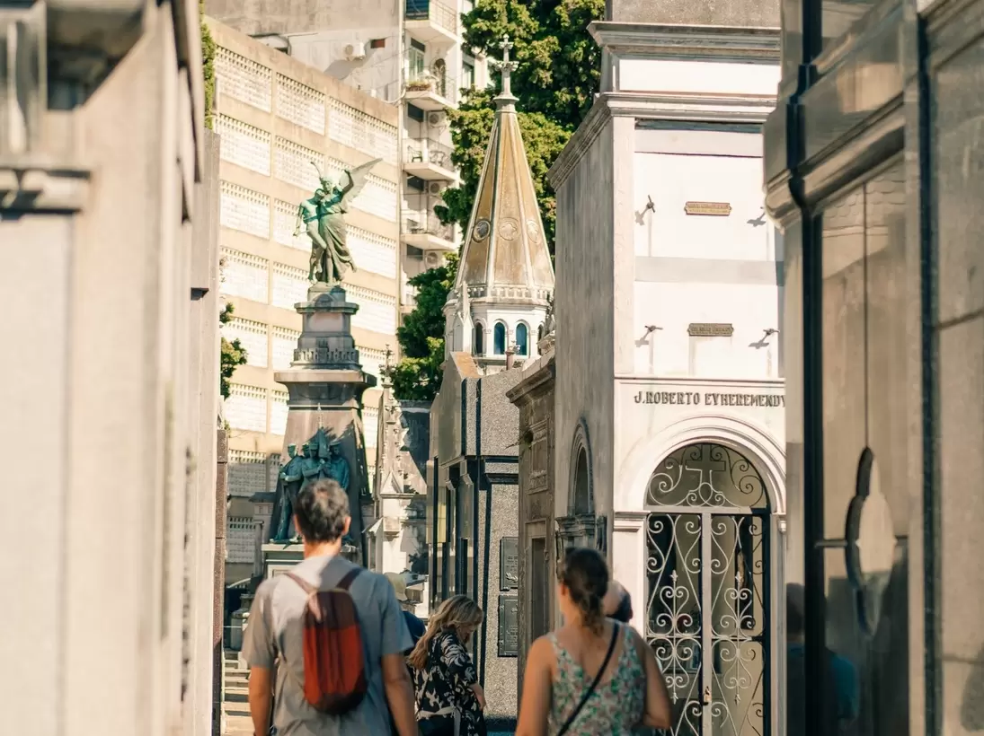 People walking through Recoleta Cemetery, the most famous cemetery in Buenos Aires, Argentina.