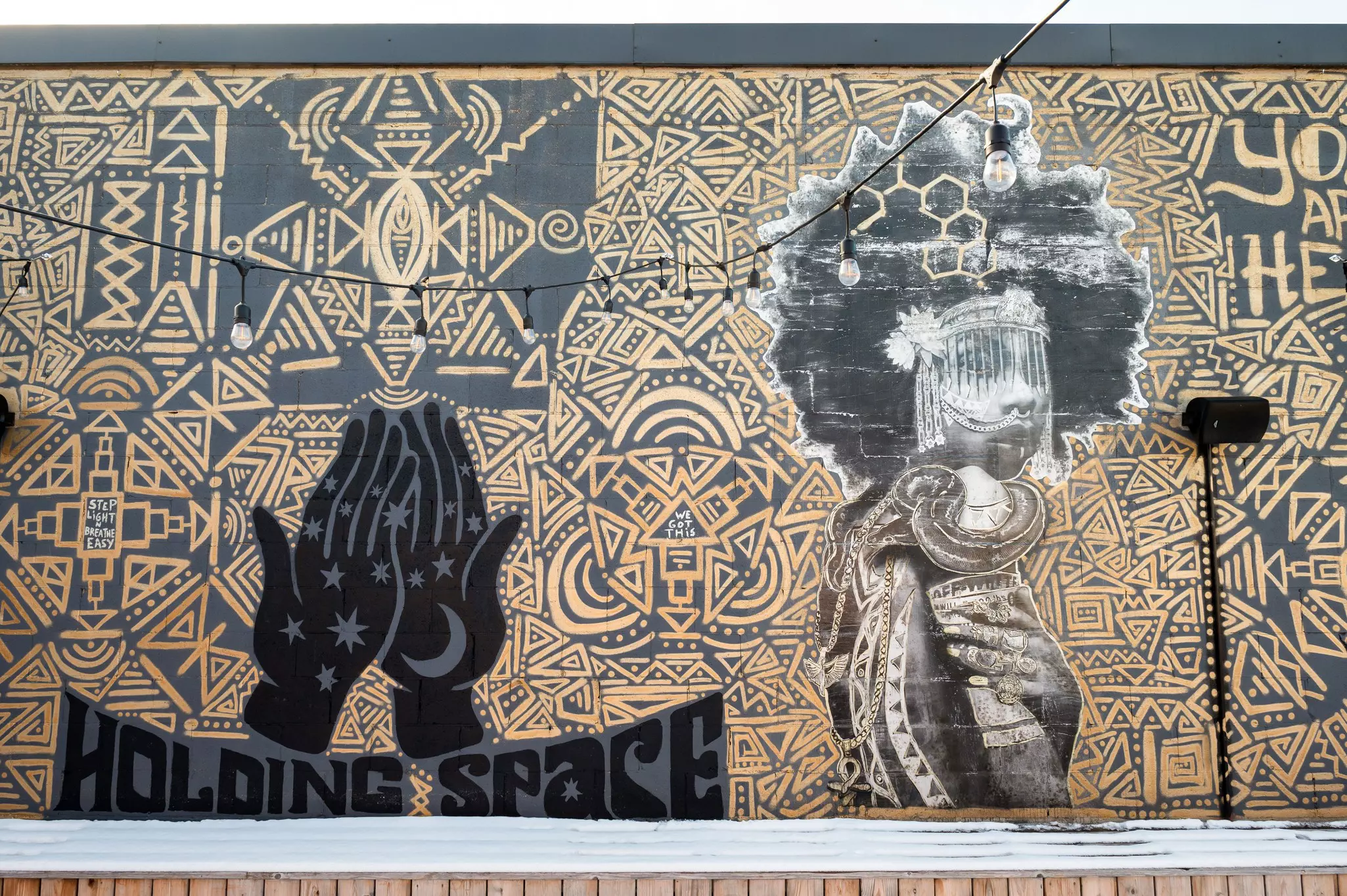 A rooftop deck is decorated by murals from local artists © Ryan Fung/Lonely Planet