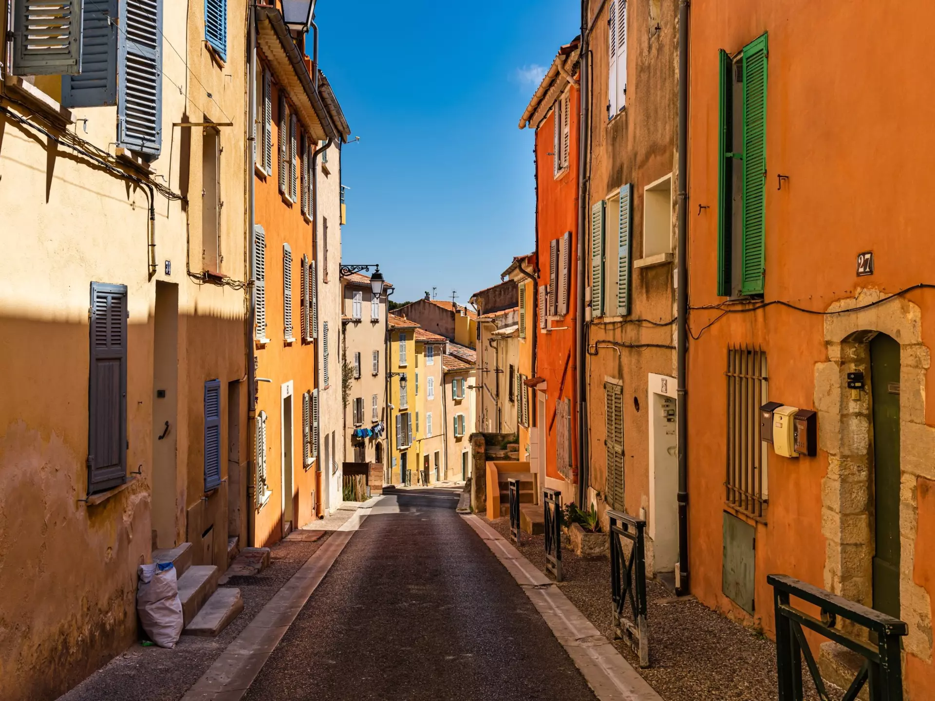 A colorful backstreet in the old town in Hyères, France. 