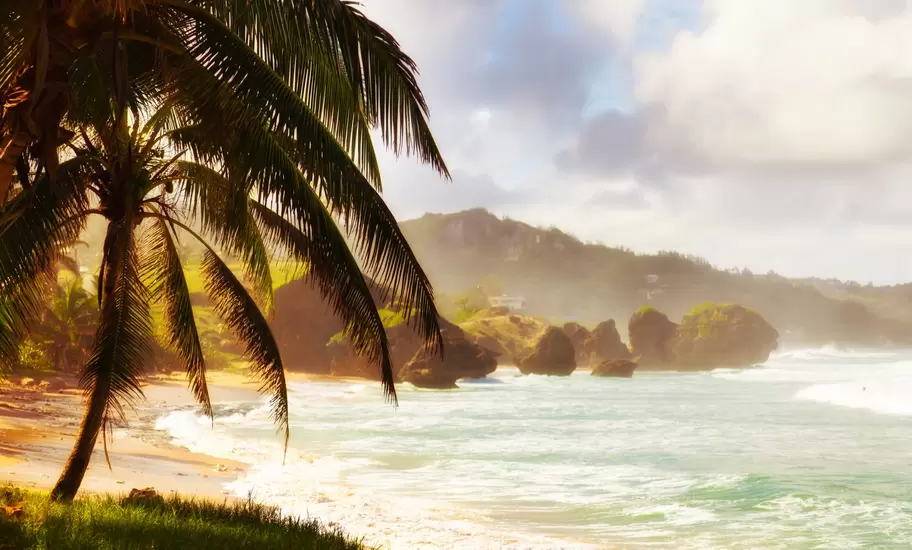 Sunset at the beach in Bathsheba, East coast of Barbados, Lesser Antilles.