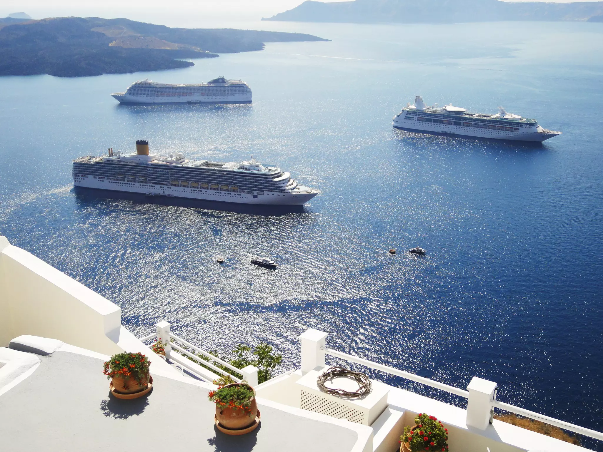 Ferries running on the sea viewed from a white building