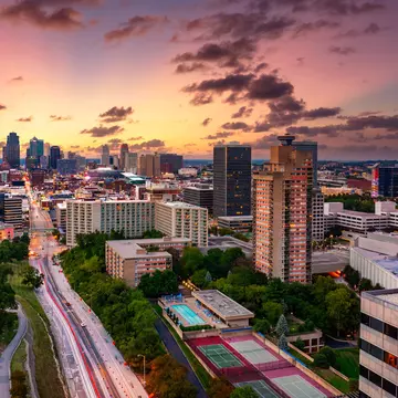 Aerial view of Kansas City skyline at dusk, viewed from Penn Valley Park. Kansas City is the largest city in Missouri.
