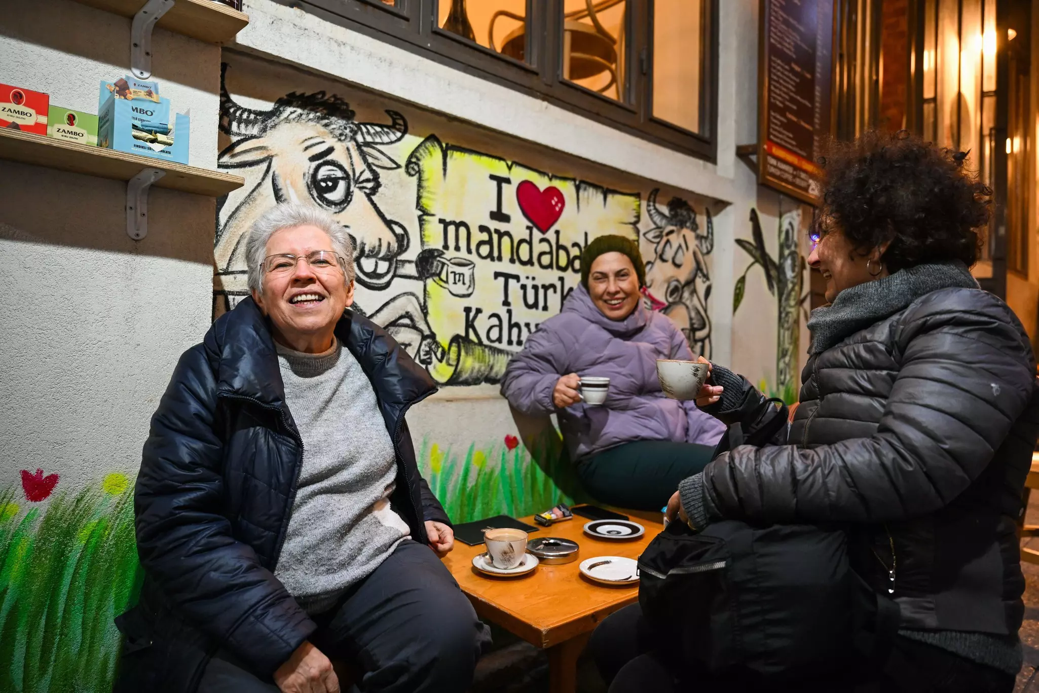 A group of women enjoy Turkish coffee outside a cafe in Istanbul.