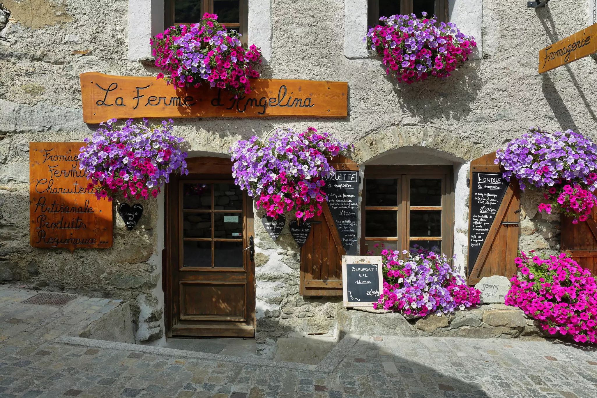 View of colorful shop in french old village of Bonneval Sur Arc, one of the most beautiful villages in France.