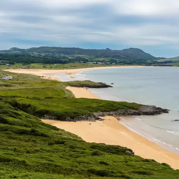 A view of the beautiful Ballymastocker Beach on the western shroes of Lough Swilly in Ireland; Shutterstock ID 2177793979;