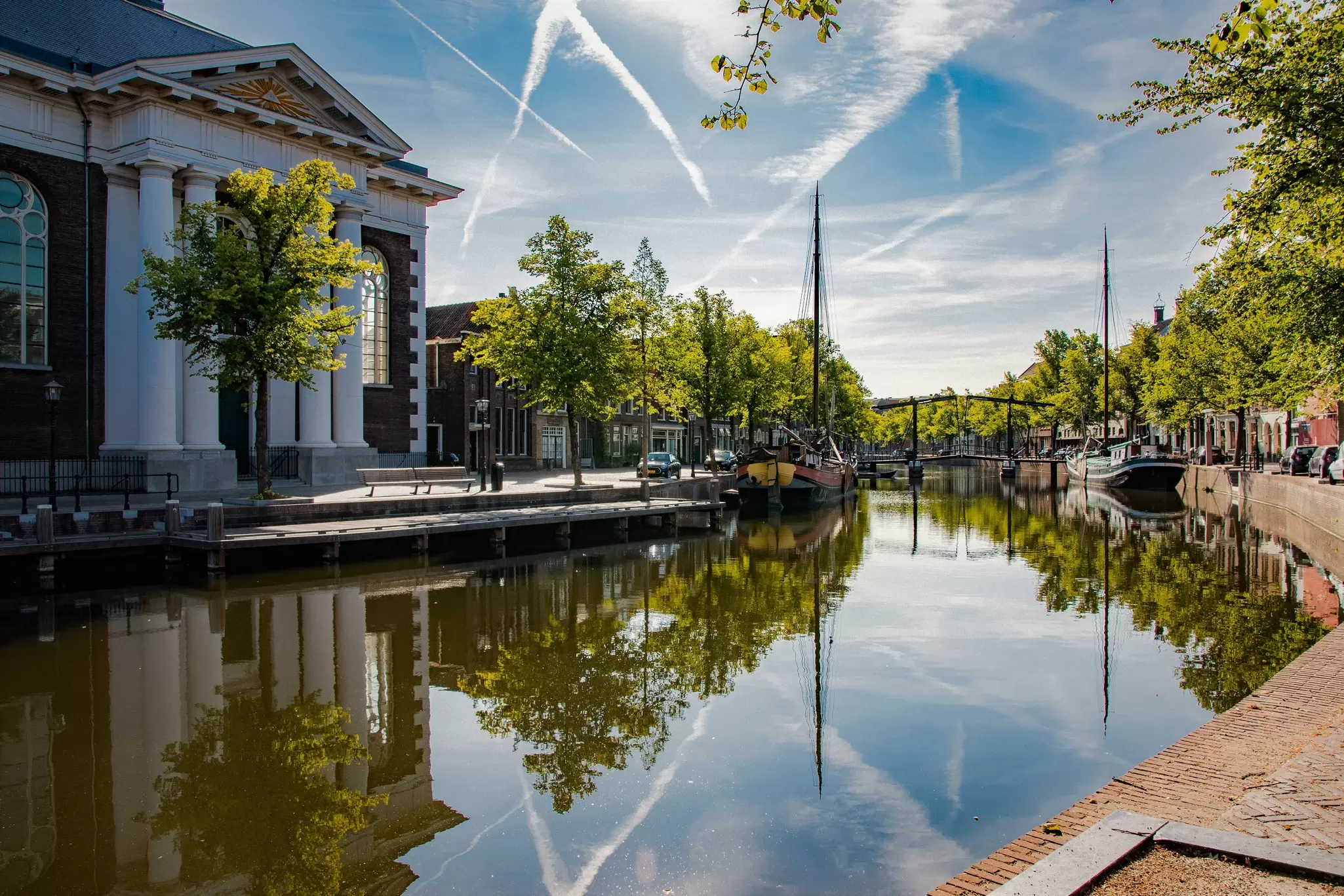 Schiedam's picturesque canals are merely an accompaniment to its main draw: gin. miranda leenheer / Shutterstock