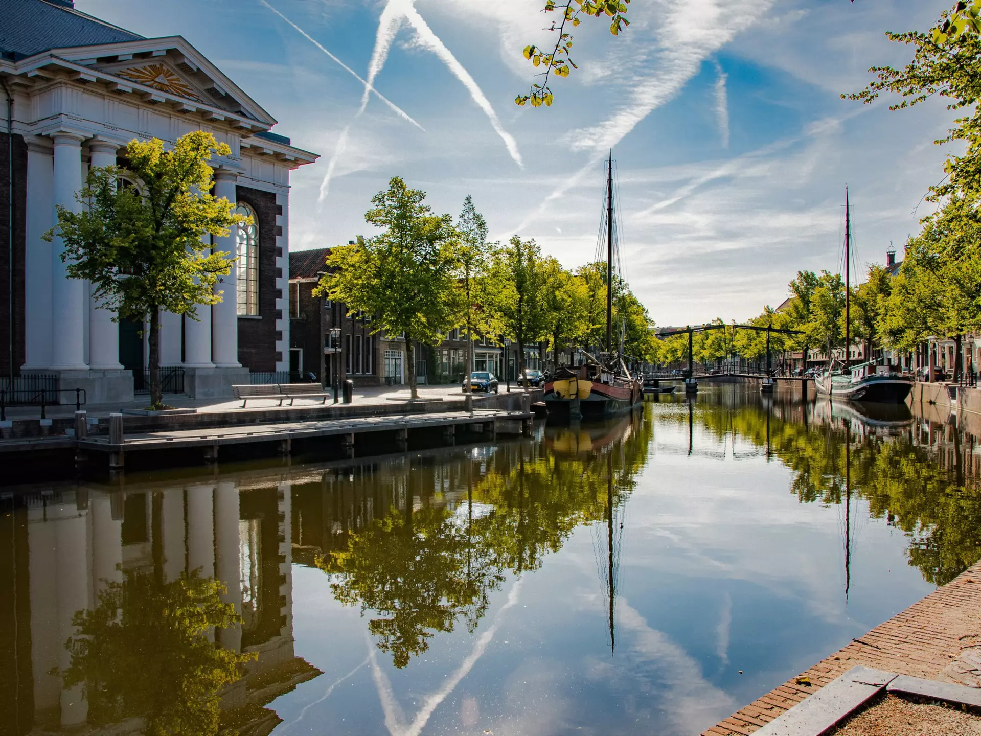 Schiedam's picturesque canals are merely an accompaniment to its main draw: gin. miranda leenheer / Shutterstock