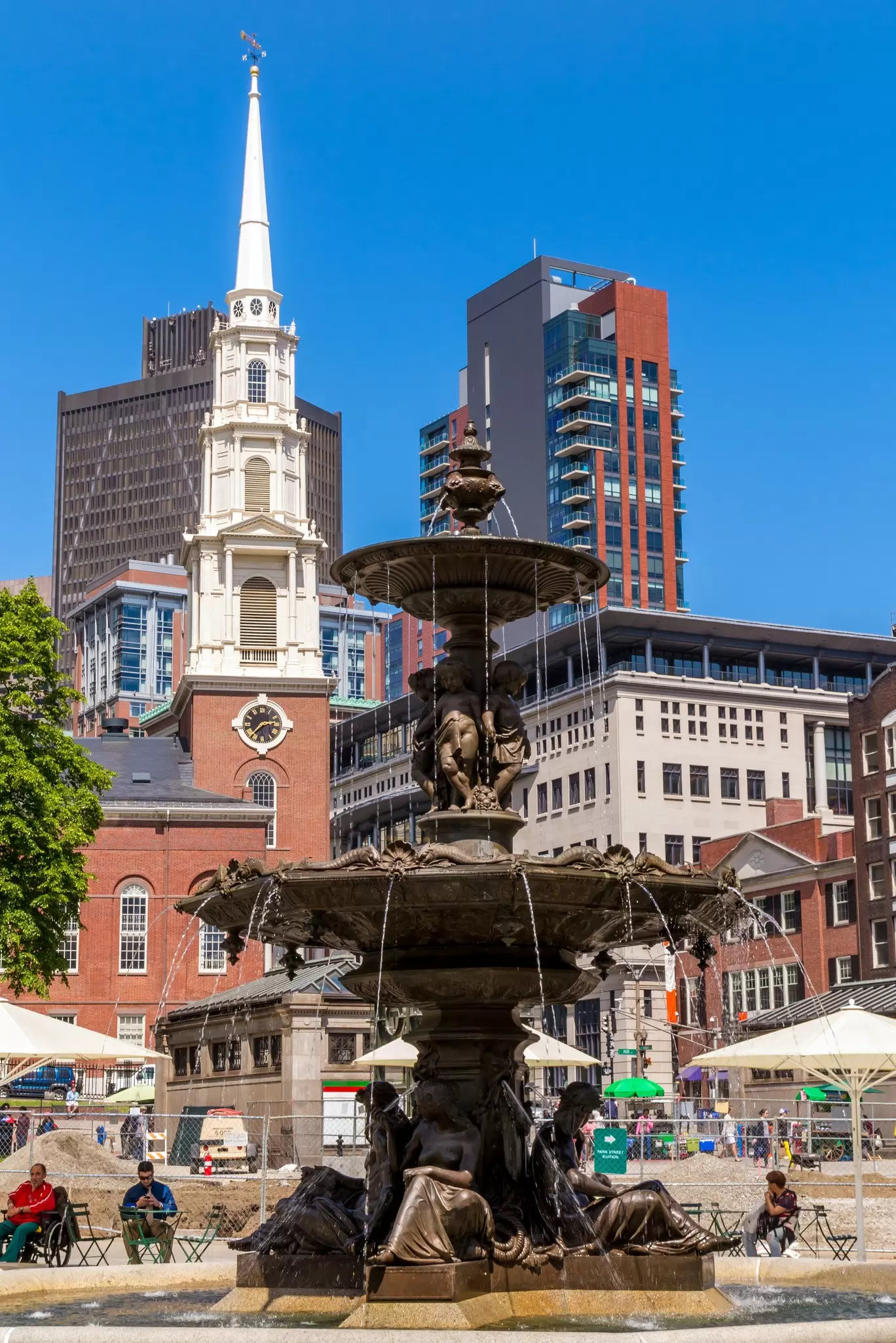 View of the Brewer Fountain in Boston Common, with the Steeple of Park Street Church in the background in Boston, Massachusetts.