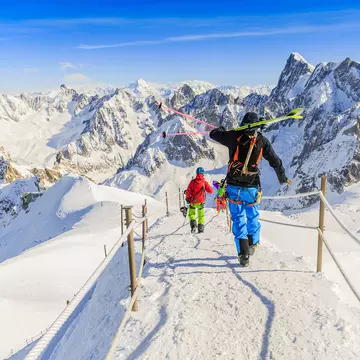 Mountains and freeriders at Aiguille du Midi in the French Alps