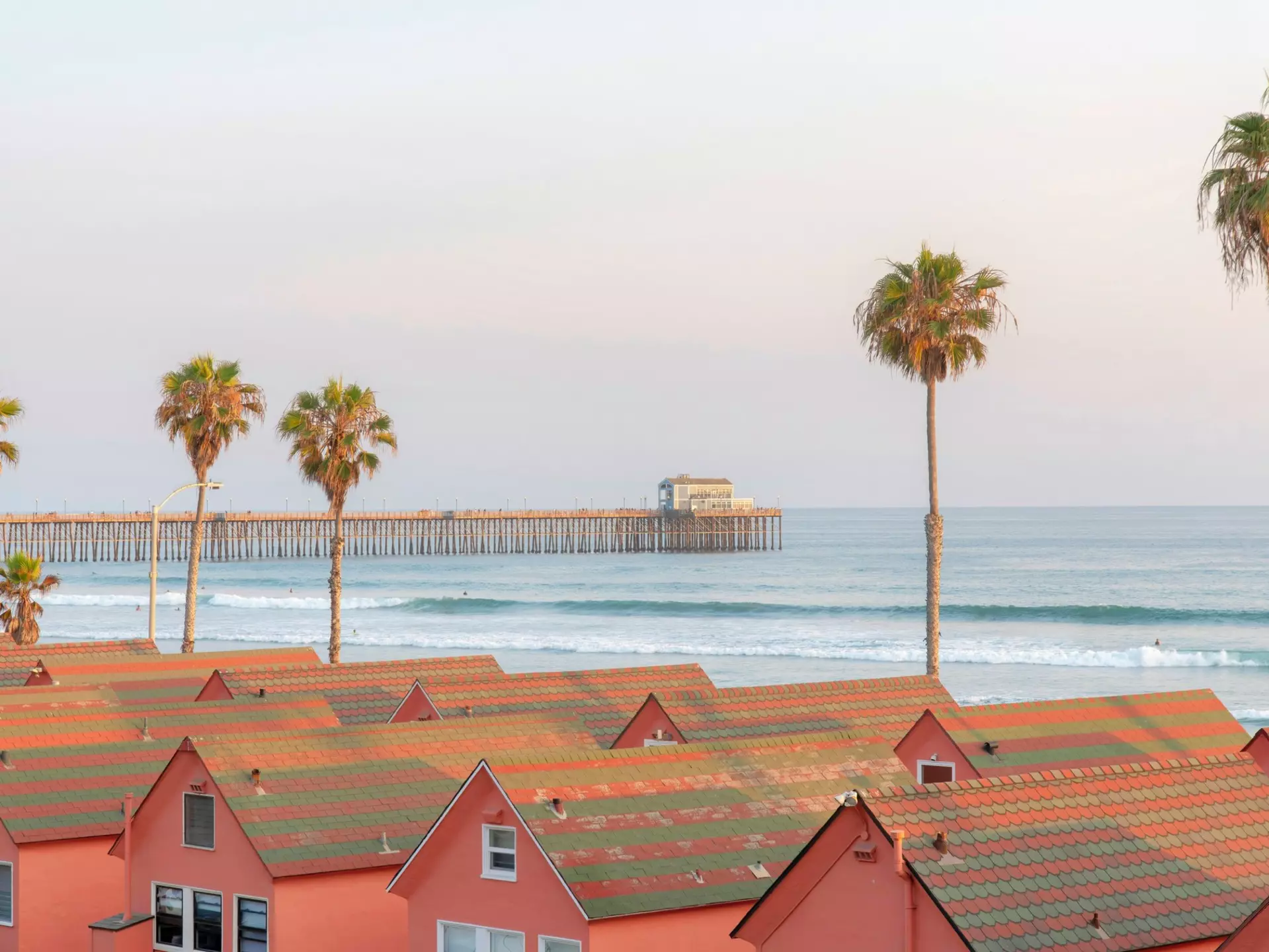 Shingled homes and Oceanside Pier in Oceanside, California. Jason Finn/Shutterstock