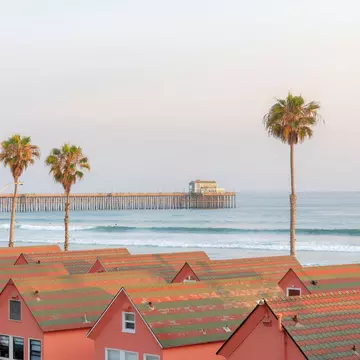 Shingled homes and Oceanside Pier in Oceanside, California. Jason Finn/Shutterstock