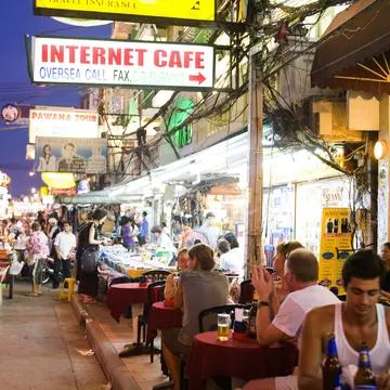 Westerner with Thai girl, Kao San Road, Banglamphu.
