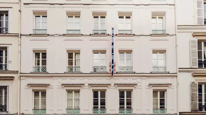 A building's white facade.