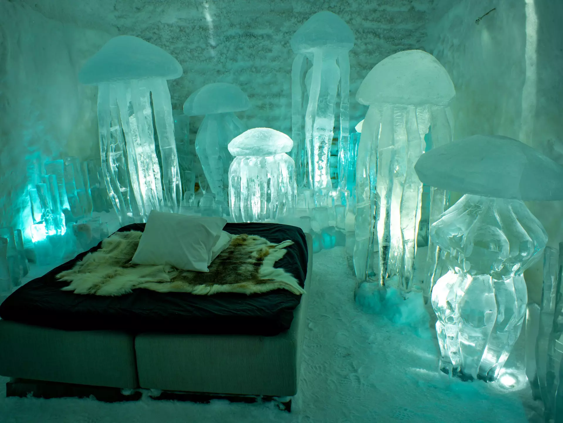 An ice room inside of an Icehotel.
