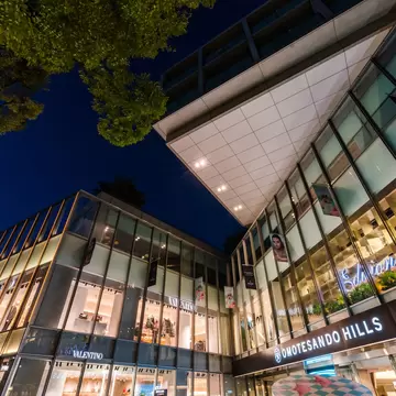 SHIBUYA, TOKYO / JAPAN - OCTOBER 21 2018 : Night view of "Omotesando" street. There are luxury brand shops, etc. "Omotesando Hills", many people visit.  License Type: media  Download Time: 2023-11-28T15:33:05.000Z  User: nic.dhoedt_lonelyplanet  Is Editorial: Yes  purchase_order:   