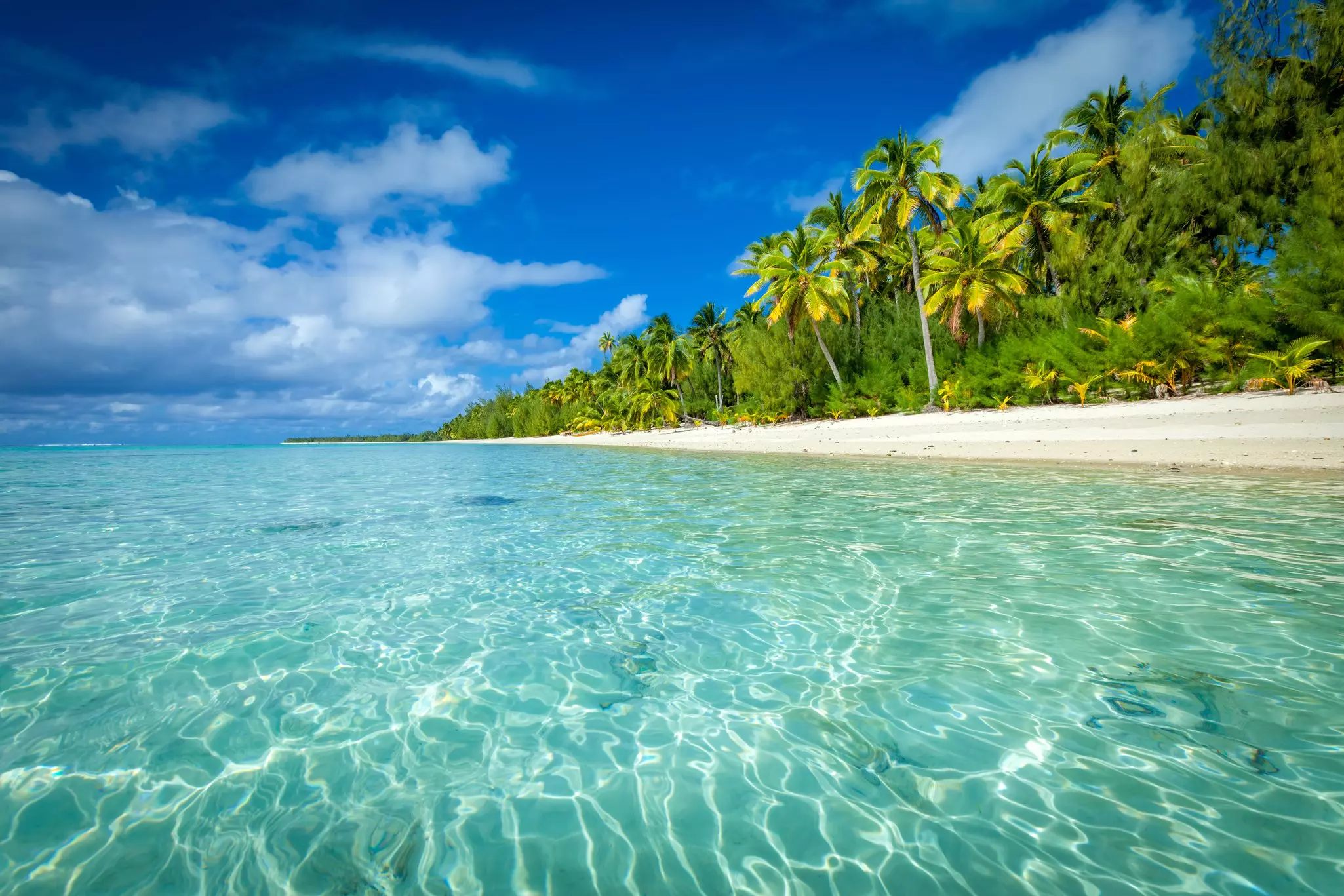Aitutaki Island is famous for its turquoise central lagoon, uninhabited islands and palm-fringed beaches.